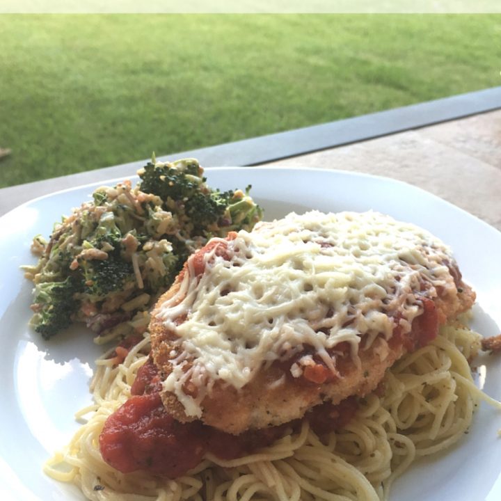 This Easy Chicken Parmesan Recipe is amazing and so simple to make at home. Y'all have to try it!