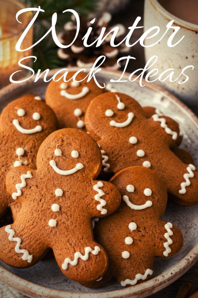Easy winter snack ideas featuring a plate of homemade gingerbread cookies for a cozy seasonal treat.