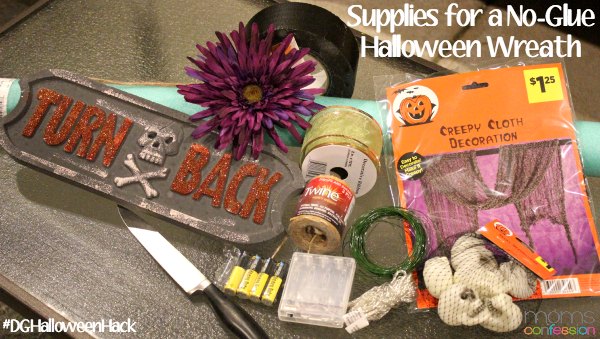 Everything you need to make a simple no-glue Halloween wreath can be found at Dollar General!