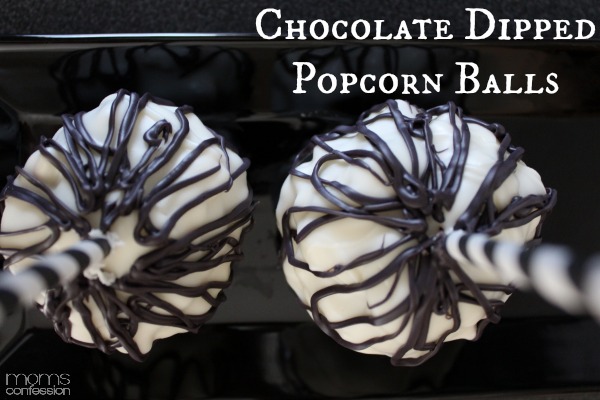 These chocolate dipped popcorn balls are so delicious! Must try!
