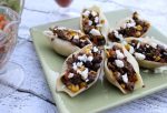 These stuffed taco shells are a little spicy and pack a Tex-Mex punch! Try these stuffed tacos for your next Taco Tuesday meal...everyone will love them!