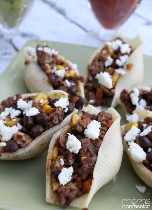 These stuffed taco shells are a little spicy and pack a Tex-Mex punch! Try these stuffed tacos for your next Taco Tuesday meal...everyone will love them!