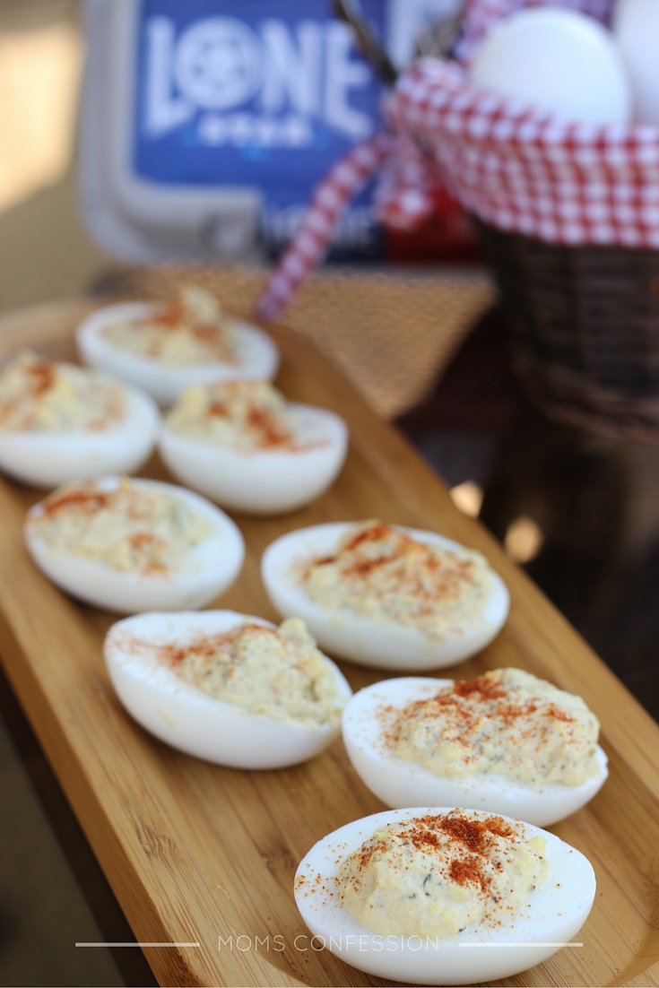 Simple Deviled Eggs on a brown platter