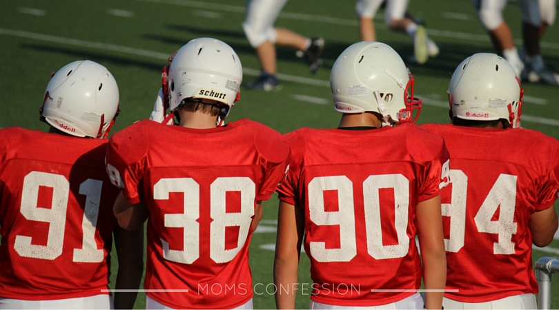 Katy football boys on the field at a game