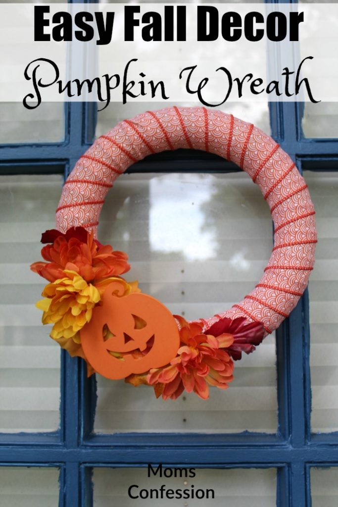 Easy Fall Decor like this Pumpkin Wreath is a great option for making your front door look festive for Fall!
