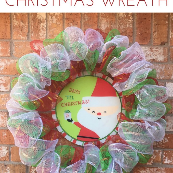 Make this DIY Advent Christmas Wreath to hang on your door this holiday season! A great DIY craft your kids will love seeing arrive for the season!