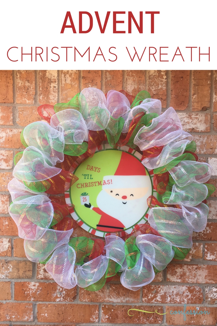 Make this DIY Advent Christmas Wreath to hang on your door this holiday season! A great DIY craft your kids will love seeing arrive for the season! | Christmas Wreath | Christmas Decor | Advent Calendar 