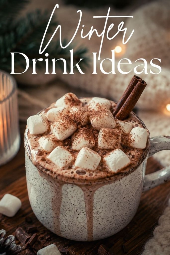 Cozy winter drink featuring creamy hot chocolate topped with marshmallows, chocolate shavings and cinnamon sticks.