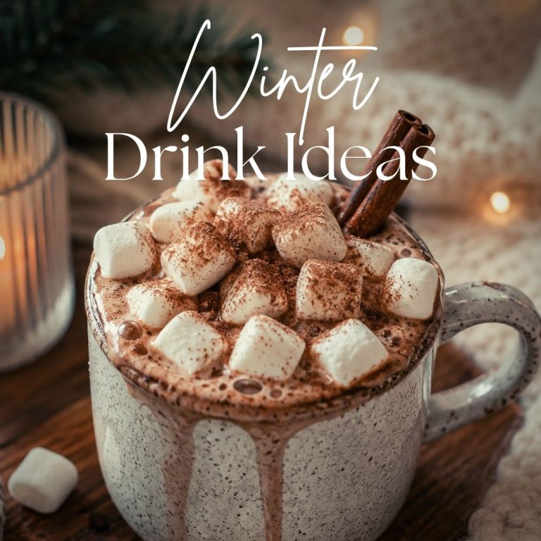 Winter drink ideas featuring a cozy mug of hot chocolate topped with marshmallows, chocolate and cinnamon sticks.