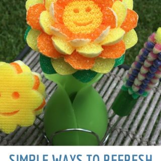 Scrub Daddy Dishwand System on a Table to Refresh your Home for Spring