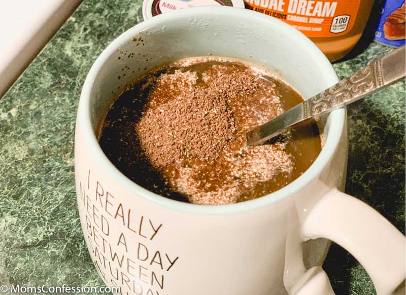 closeup of Chocolate Mocha Coffee Recipe with hot cocoa mix in the mug ready to mix