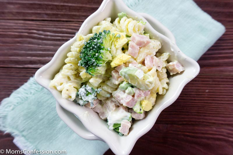 horizontal overhead photo of Leftover Ham Pasta Recipe in a white square bowl on a table ready to eat