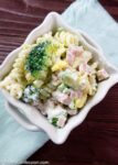 Overhead photo of Leftover Ham Pasta Recipe in a white square bowl on a table ready to eat