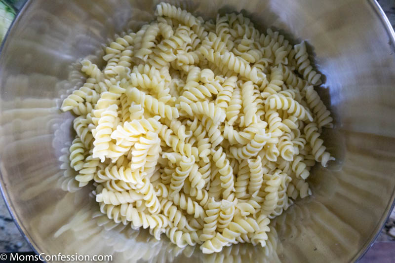 rotini noodles in a large mixing bowl