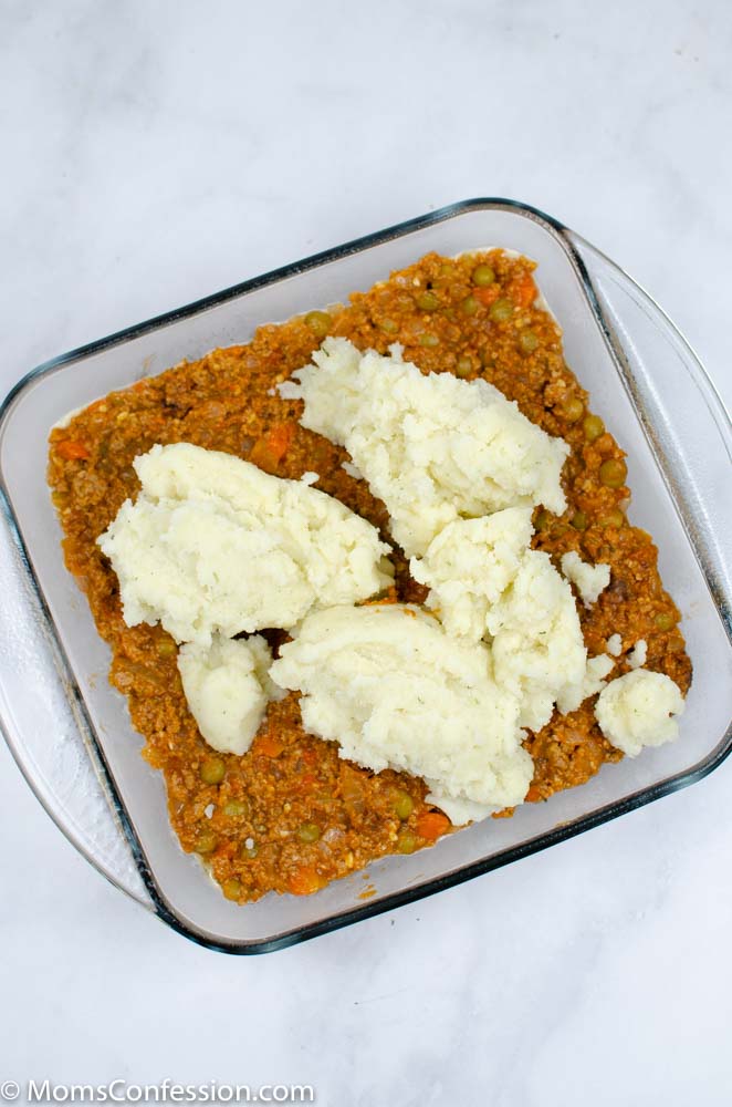 Simple Shepherd’s Pie Recipe in a clear dish with mashed potatoes on top