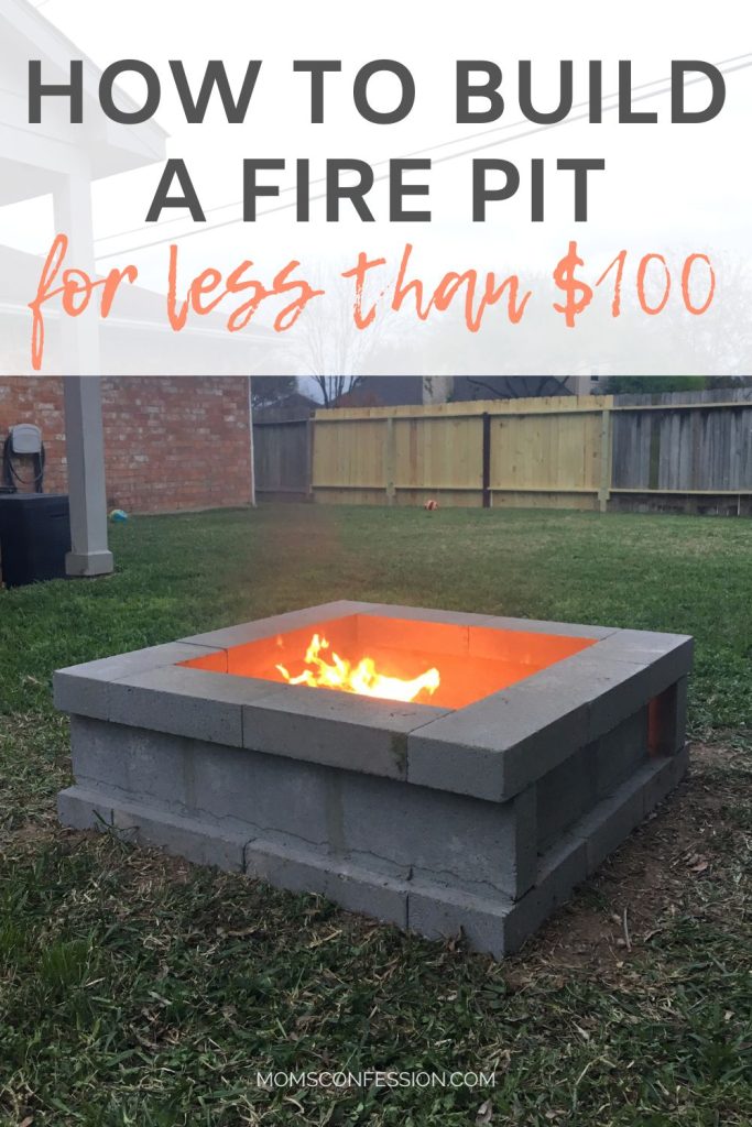 square concrete block fire pit burning in a backyard built for under $100